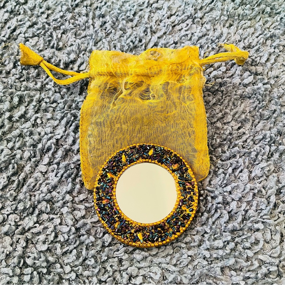 Beautiful sequined and beaded mirror
